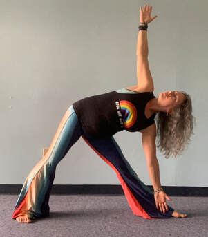 Clarissa Boggess in triangle pose