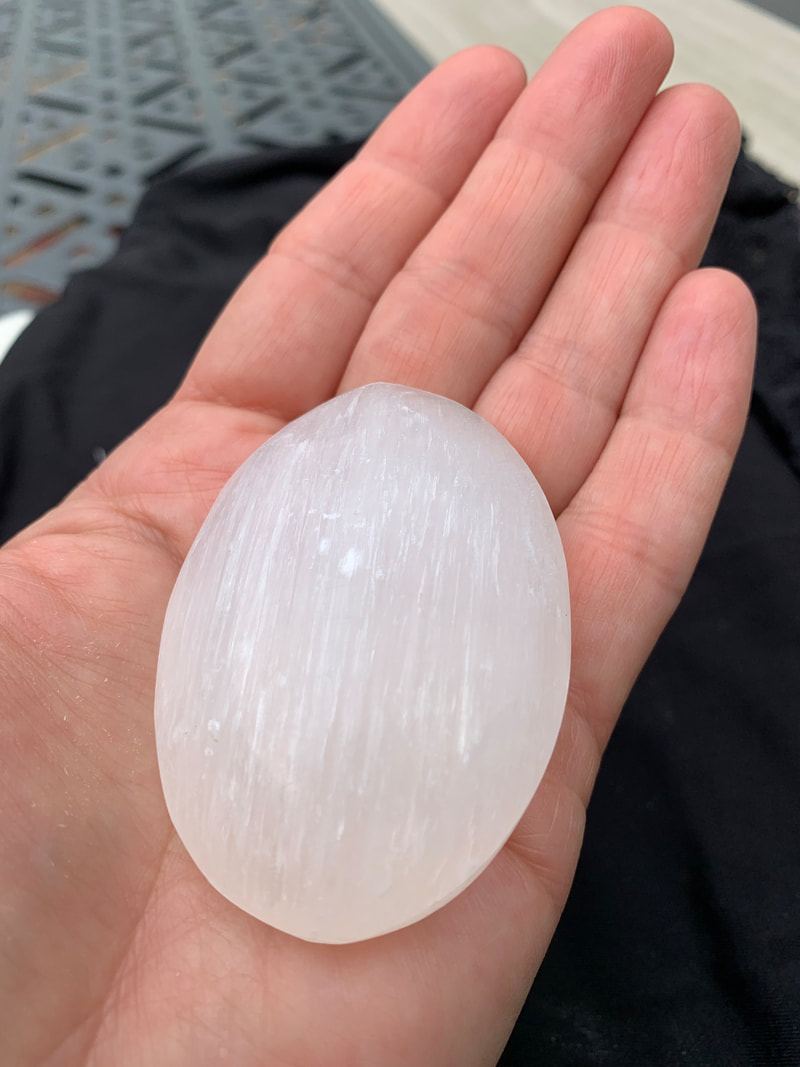 Selenite palm stones